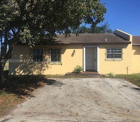 Photo of 3009 NW 204th Ter, Miami Gardens, FL 33056 (MLS # A12069368)