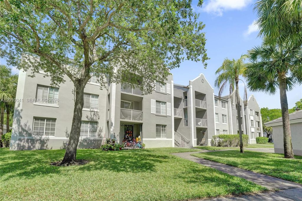 Photo of 631 SW 111th Lane #306, Pembroke Pines, FL 33025 (MLS # A12010041)