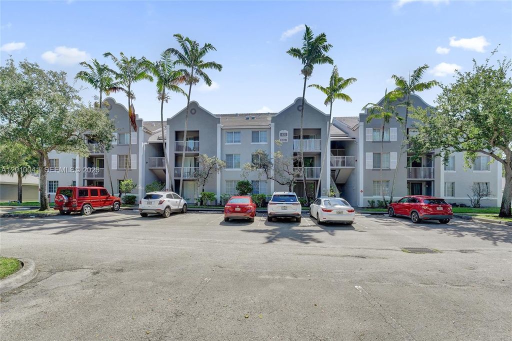 Photo of 631 SW 111th Lane #306, Pembroke Pines, FL 33025 (MLS # A12010041)