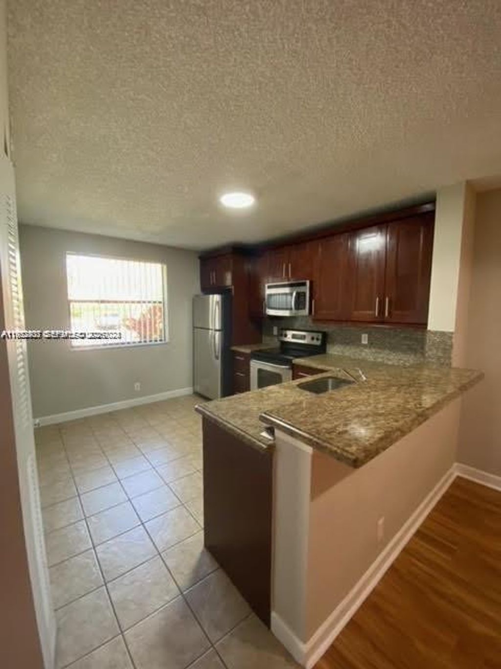 Photo of 5841 Riverside Dr #106A3, Coral Springs, FL 33067 (MLS # A11952803)