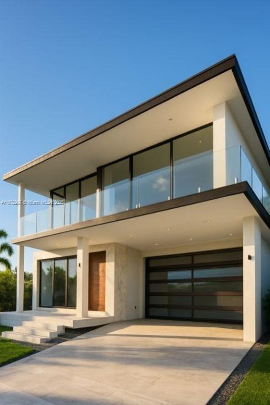 Experience luxury waterfront living in this newly built masterpiece on Treasure Island. This 6-bedroom, 6-bathroom home features a double-height living room with floor-to-ceiling windows showcasing unobstructed views of Biscayne Bay and Miami’s skyline. The gourmet kitchen and bayfront primary suite offer elegance and comfort, while each guest bedroom includes an ensuite bath. Enjoy outdoor entertaining with a summer kitchen, private pool, rooftop terrace, and expansive terraces. The property includes a new seawall and 60-ft dock with direct ocean access. Located in a rapidly growing area with a 13-acre mixed-use development underway, this home is a rare opportunity to own a slice of paradise.