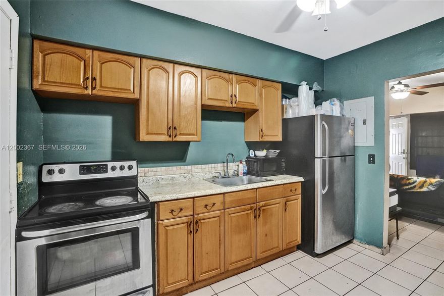 Property being used as a tri-plex, one unit is occupied and the others are on lock box