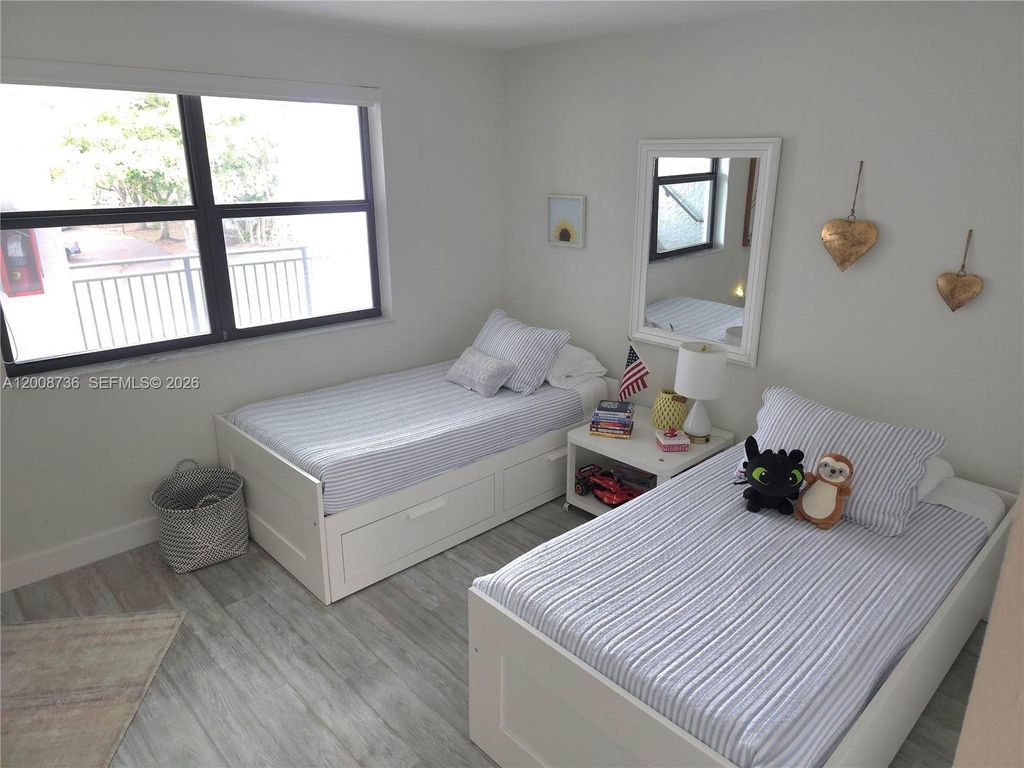 Photo of 16171 Blatt Blvd #302, Weston, FL 33326 (MLS # A12008736)
