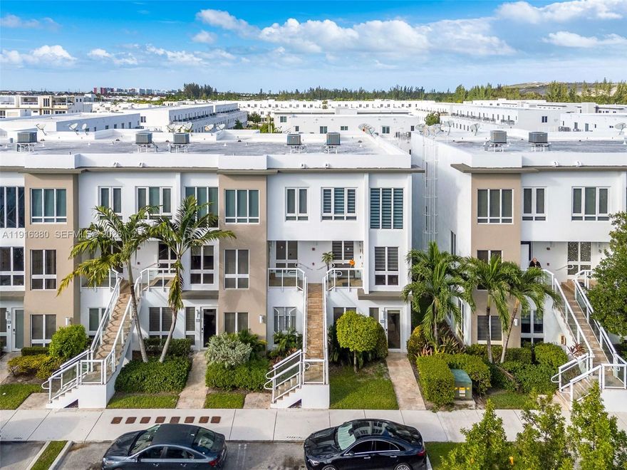 Beautiful and modern corner condo in Landmark at Doral, located on the ground and first floor, featuring 3 bedrooms and 2 bathrooms. This elegant residence was originally the Lennar model unit and includes ceiling molding, designer wall accents, and an open-concept kitchen with high-quality finishes. Enjoy bright and spacious living areas, porcelain floors, and soft vinyl flooring in the bedrooms. The unit also offers a private parking space. Move-in ready and perfect for those seeking style, comfort, and a prime location in one of Doral’s most desirable communities.