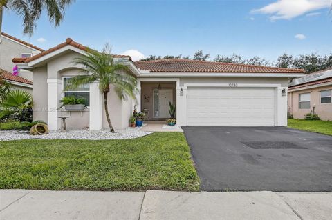 Photo of 12740 NW 11th Ct, Sunrise, FL 33323 (MLS # A11891401)