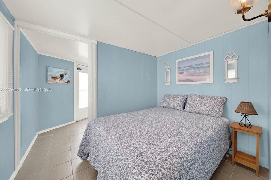 Your beach home awaits in sunny Hutchinson Island. This home offers a bright and airy open floor plan with 1.5 baths, 2 bedrooms, laundry room and accordion shutters on all windows. There is plenty of parking with room for your golf cart to zip you to a private beach access were you can enjoy plunging into a heated pool, or lounge on the beach with a refreshing drink and sand in your toes. You may use your home as a full time residence, seasonal escape or vacation retreat. Island living is calling with a Motivated Seller awaiting.