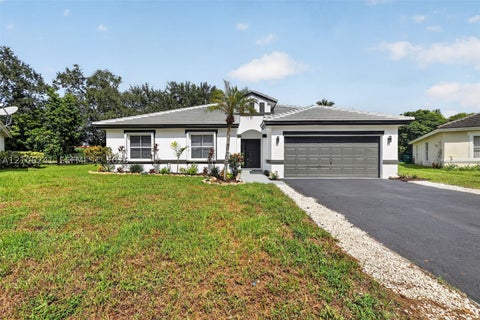 Photo of 9407 SW 18th St, Miramar, FL 33025 (MLS # A12106241)