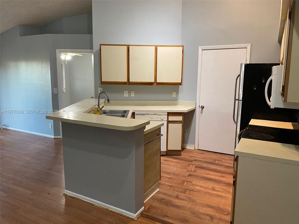 Photo of 9999 Summerbreeze Dr #618, Sunrise, FL 33322 (MLS # A11977626)