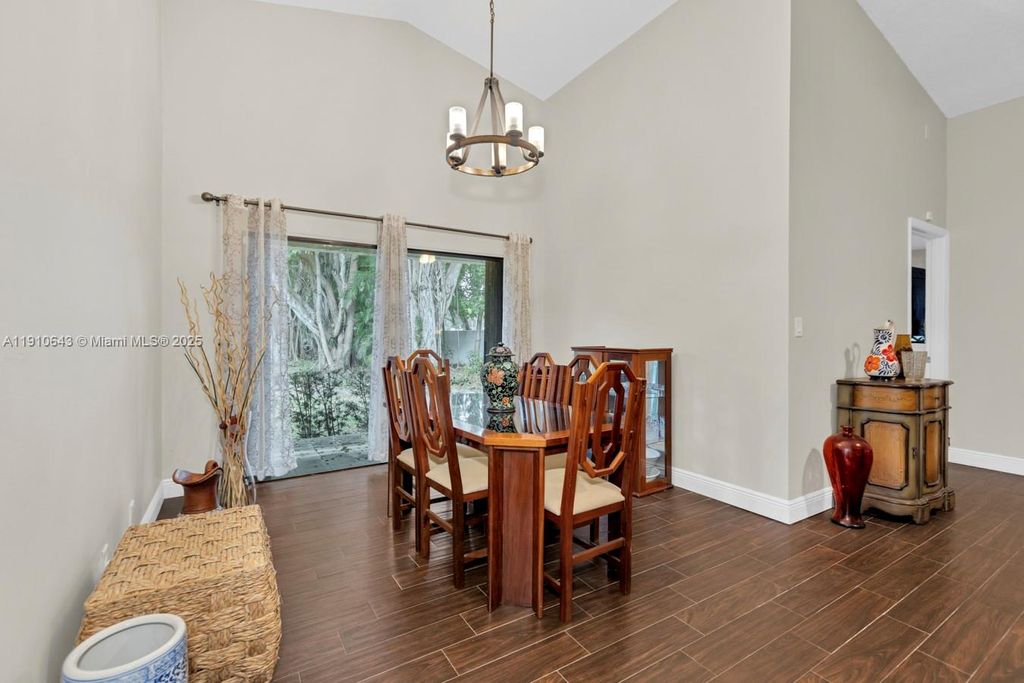 Photo of 1858 Tamarind Ln, Coconut Creek, FL 33063 (MLS # A11910643)