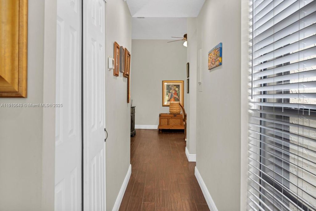 Photo of 1858 Tamarind Ln, Coconut Creek, FL 33063 (MLS # A11910643)