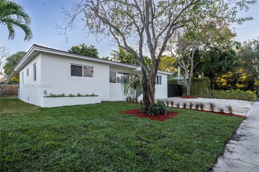 Turn-keY, beautifully updated 3-bedroom, 2.5-bathroom home offering a bright, open-concept layout designed for both comfortable living and effortless entertaining. The modern kitchen features sleek cabinetry and premium KitchenAid appliances, creating a stylish and functional space for cooking and gathering.
Step outside to an expansive, beautifully maintained backyard, perfect for outdoor dining, relaxing, or hosting guests. The generous outdoor space offers plenty of room to add a pool or expand the home, giving you flexibility for future customization. Located just minutes from downtown South Miami and Coral Gables, with convenient access to excellent schools, parks, shopping, and dining. This move-in-ready residence offers the perfect combination of comfort, style, and location.