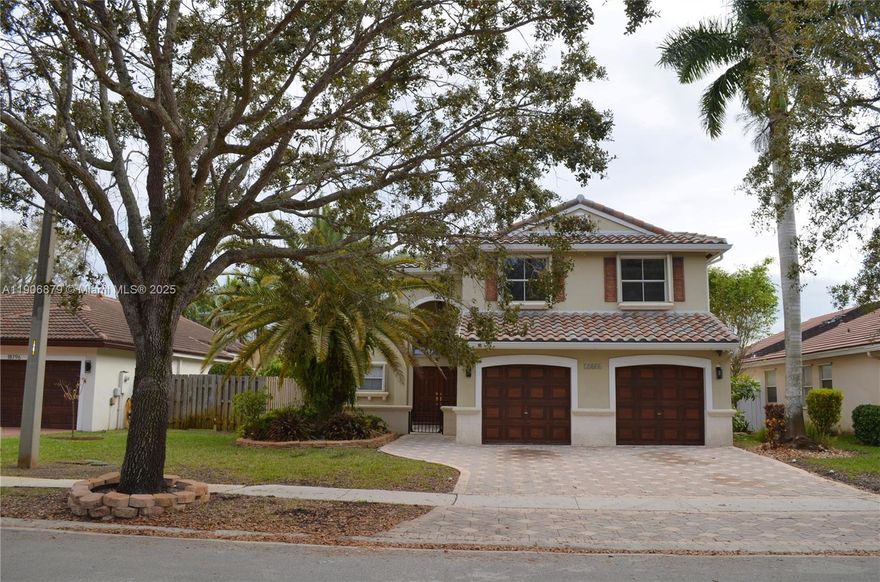 Luxurious remodeled home in Keystone Lakes a gate community, 3 bedrooms + Den, Marble  in first floor, wood on second floor, granite counter top, stainless steel appliances and wine cooler.  Roof done in 2024.  Entertain by the pool and spa on a sunny Florida day.