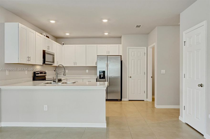 Beautiful 2-bedroom, 2-bath villa located in the desirable gated community of Magnolia Landing. Built in 2022, this well-maintained one-story home offers approximately 1,497 sq ft of living space with an open-concept layout designed for comfortable Florida living. The split-bedroom floor plan provides privacy, while the spacious living and dining area flows seamlessly into the kitchen—perfect for entertaining or everyday living. The home features a 2-car attached garage, modern finishes, and a lanai where you can relax and enjoy peaceful lake views. The primary suite offers a walk-in closet and en-suite bathroom, while the guest bedroom and bath are ideal for visitors or a home office. Residents of Magnolia Landing enjoy resort-style amenities including a championship golf course, community pool, fitness center, clubhouse, and dining options. Conveniently located near shopping, dining, and major roadways, this home offers the perfect blend of tranquility and accessibility in North Fort Myers.