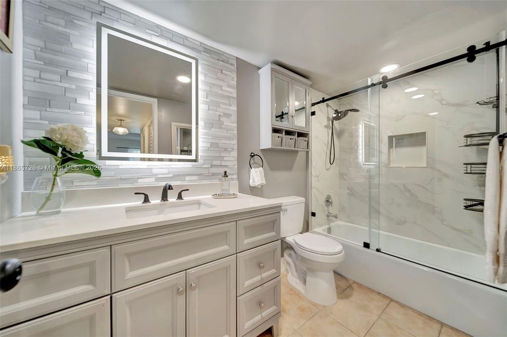 Photo of 3575 Broken Woods Dr #201, Coral Springs, FL 33065 (MLS # A11865726)