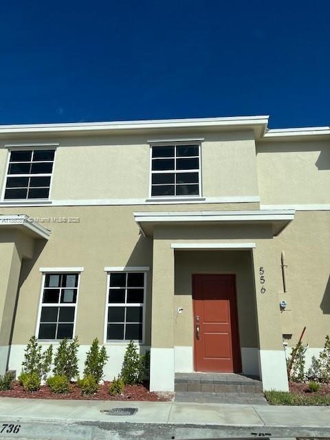 Beautiful Townhouse 2/2.5 with 2 assign parking spaces in front. Two bedrooms upstairs with its own private bathroom and walk in closet. Modern kitchen with s/s appliances. Washer & dryer. Patio. Gorgeous clubhouse pool, and fitness center. All information is approximate and not warranted or guaranteed. ONLY 1st MONTH RENTAL AND 1 MONTH SECURITY DEPOSIT!!