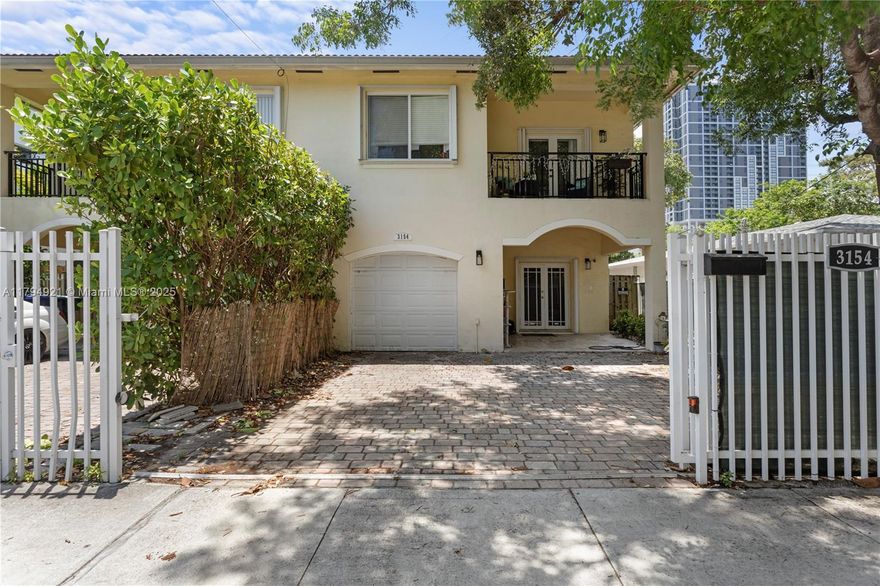 Elegant and beautifully maintained 3-bedroom, 2.5-bathroom luxury townhome perfectly situated in the vibrant heart of Coconut Grove. Designed with a spacious, light-filled layout, this home features tile and hardwood floors throughout. The modern kitchen is equipped with natural stone countertops and stainless steel appliances. A large family room opens through double french doors to an expansive backyard—ideal for gatherings and outdoor living. Upstairs, the generous master suite is complemented by two additional well-sized bedrooms. Enjoy unbeatable access to CocoWalk, top restaurants, charming boutiques, cafes, bayfront parks, marinas, Downtown Miami, MIA, Coral Gables, Key Biscayne, and beautiful beaches. Don’t miss your chance to call this stunning property home!
