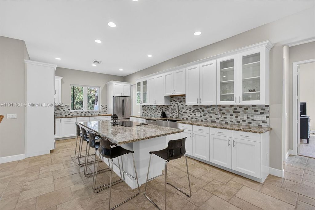 Photo of 18369 Mellen Ln, Jupiter, FL 33478 (MLS # A11911921)