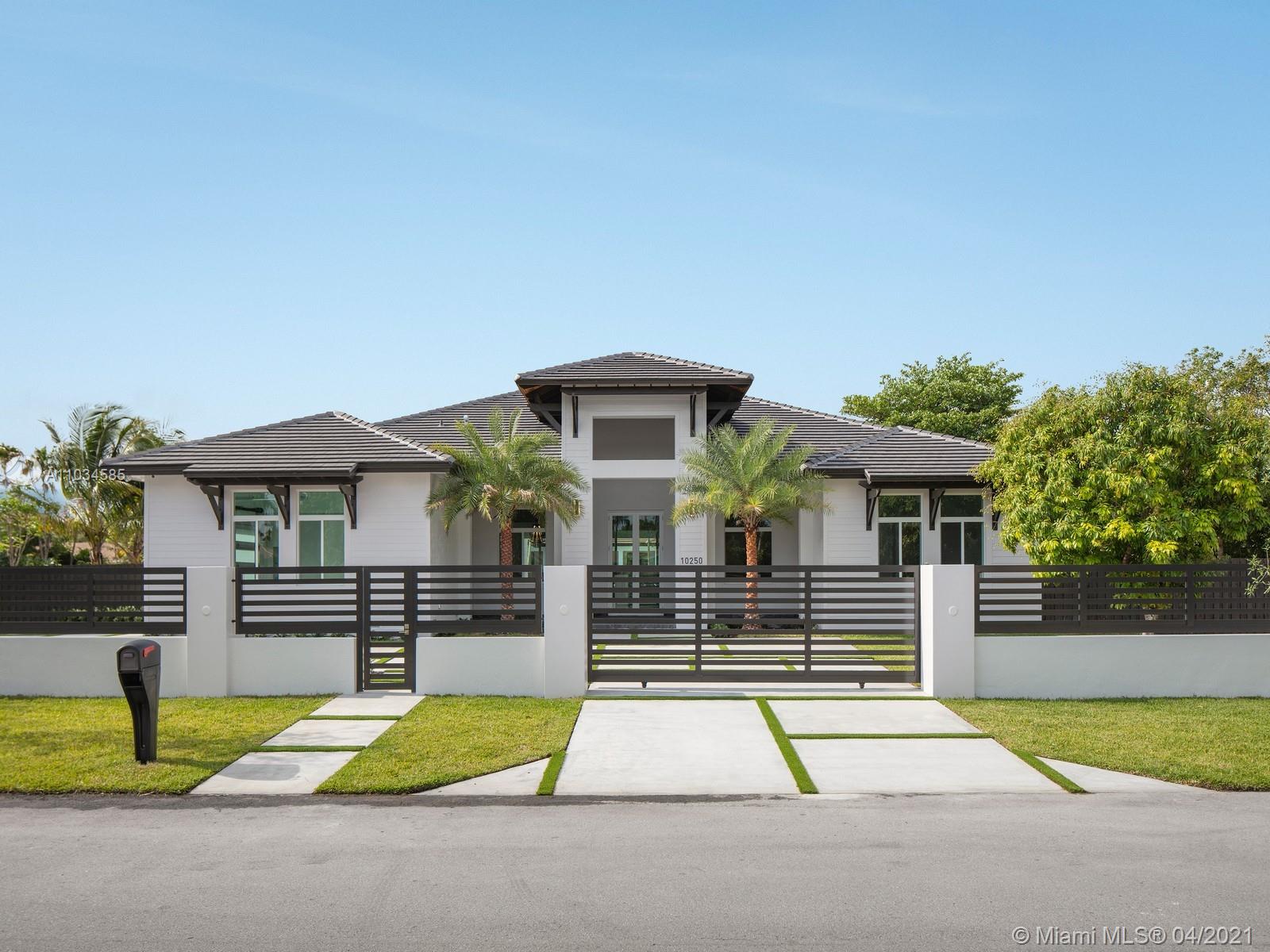 Gorgeous brand-new construction home situated on 20,928 sf walled & gated lot at the end of a quiet cul-de-sac street. Discover modern luxury finishes and details all in this exceptional floor plan featuring 5 bedrooms & 5 bathrooms with large living areas, high ceilings, porcelain floors, & natural light radiating through every room. Open concept chef’s dream kitchen w/ quartz counter tops, Thermador appliances, breakfast area overlooking pool & family room, beautiful walk-in glass wine cellar & formal dining rm. Master suite offers his/her walk-in closets, spa like bath, and outdoor access. Enjoy a spacious outdoor setting with large covered terrace, swimming pool with tanning ledge and jets + ample green grounds. Additional Features: impact windows & doors, Laundry Room, 2-car garage.