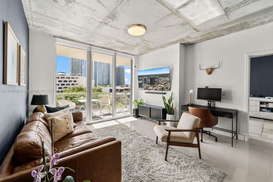 Wake up to glowing Miami sunrises and skyline views from this beautifully appointed 2-bedroom, 2.5-bath residence at coveted 2Midtown. Enjoy a spacious glass-framed terrace and an open layout featuring 10-ft ceilings, a modern kitchen with granite countertops and stainless steel appliances, generous walk-in closets, and an in-unit washer/dryer. 2Midtown redefines luxury living with resort-style amenities including a Bayview fitness center, heated pool, hot tub, plunge pools, steam room, sauna, children’s playground, and an outdoor lounge with panoramic neighborhood views. Perfectly located just one block from the Miami Design District and minutes to Wynwood and the beach, this residence offers the ultimate Miami lifestyle surrounded by world-class dining, art, and shopping.