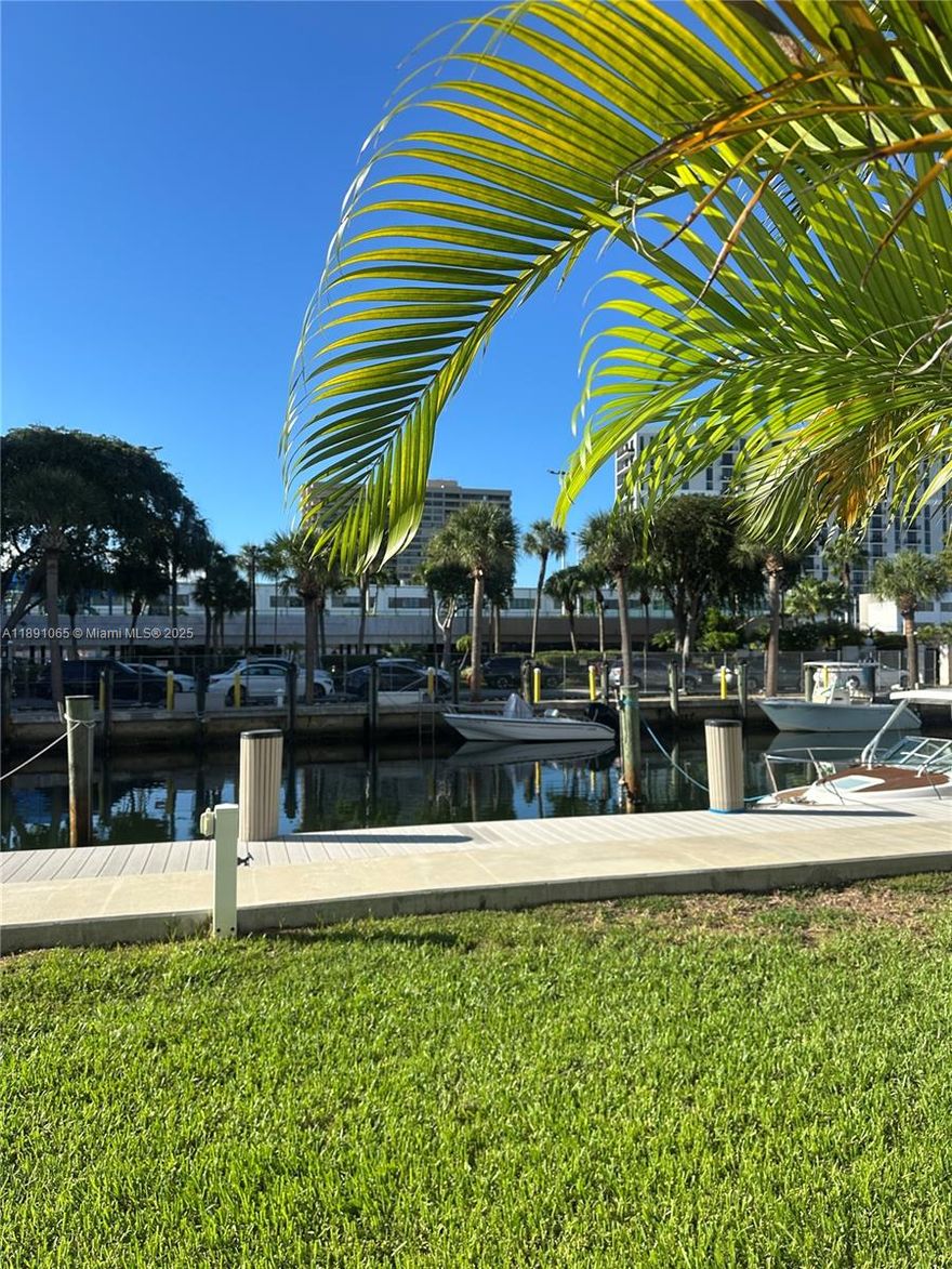 Discover peaceful waterfront living in this spacious 1-bedroom, 2-bathroom condo located directly on the canal in the desirable North Miami area. This first-floor residence offers easy access and convenience, with assigned parking right in front of the unit. Inside, enjoy a large open layout with plenty of natural light, a comfortable living and dining space, and a generously sized bedroom with two full bathrooms — perfect for work-from-home flexibility. New AC unit, patio perfect for pets. Step outside and take in the serene water views or take advantage of the docks available for rent, ideal for boat owners or water enthusiasts.