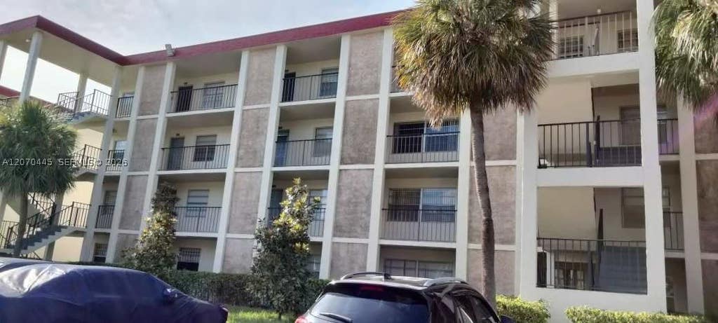 Photo of 3001 NW 48th Ave #333, Lauderdale Lakes, FL 33313 (MLS # A12070445)