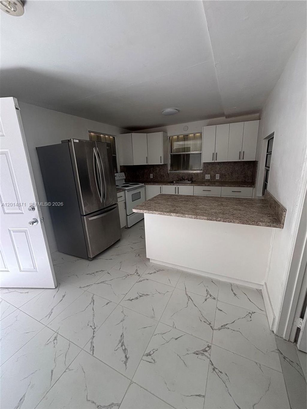 Photo of 116 Allen Rd, West Park, FL 33023 (MLS # A12014871)