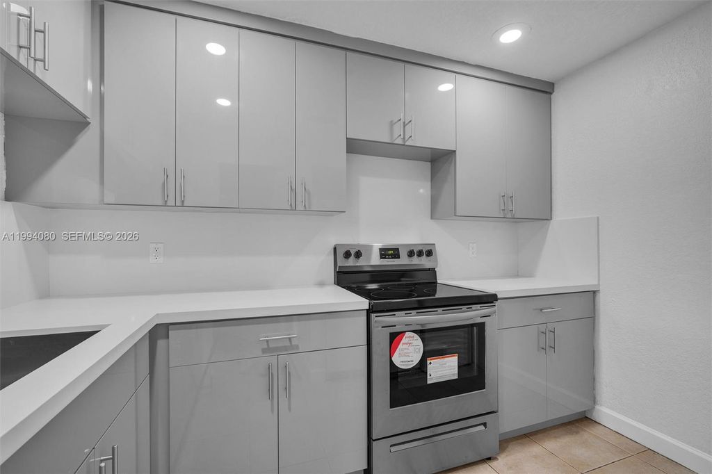 Photo of 10015 NW 4th St #203, Pembroke Pines, FL 33024 (MLS # A11994080)