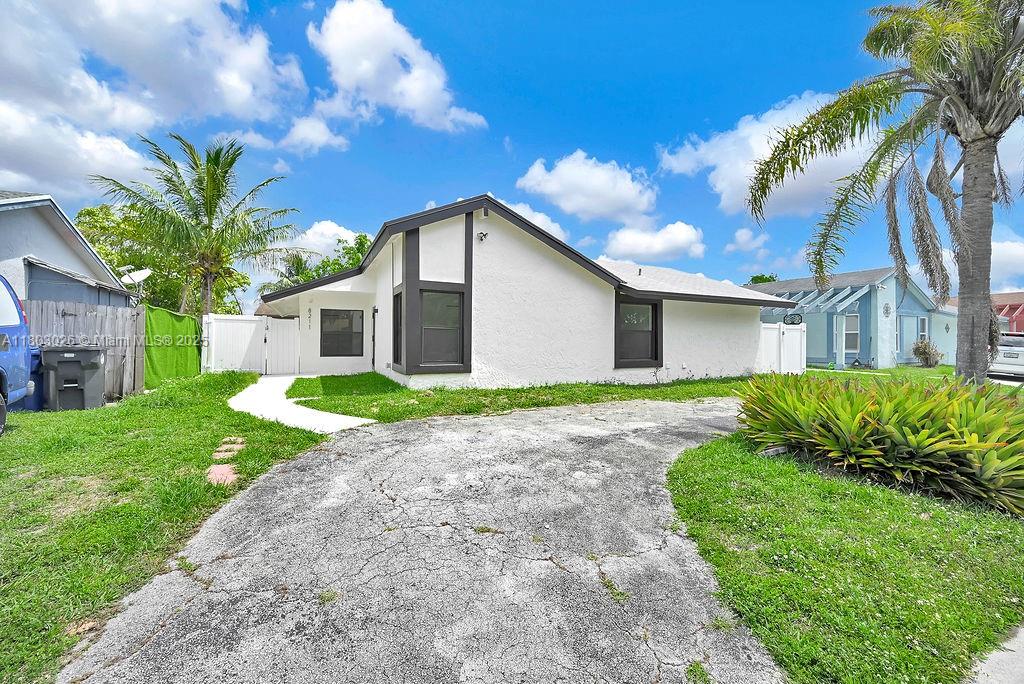 Property for Sale at 8211 Sw 4th Pl, North Lauderdale, Miami-Dade County, Florida - Bedrooms: 4 
Bathrooms: 3  - $539,900