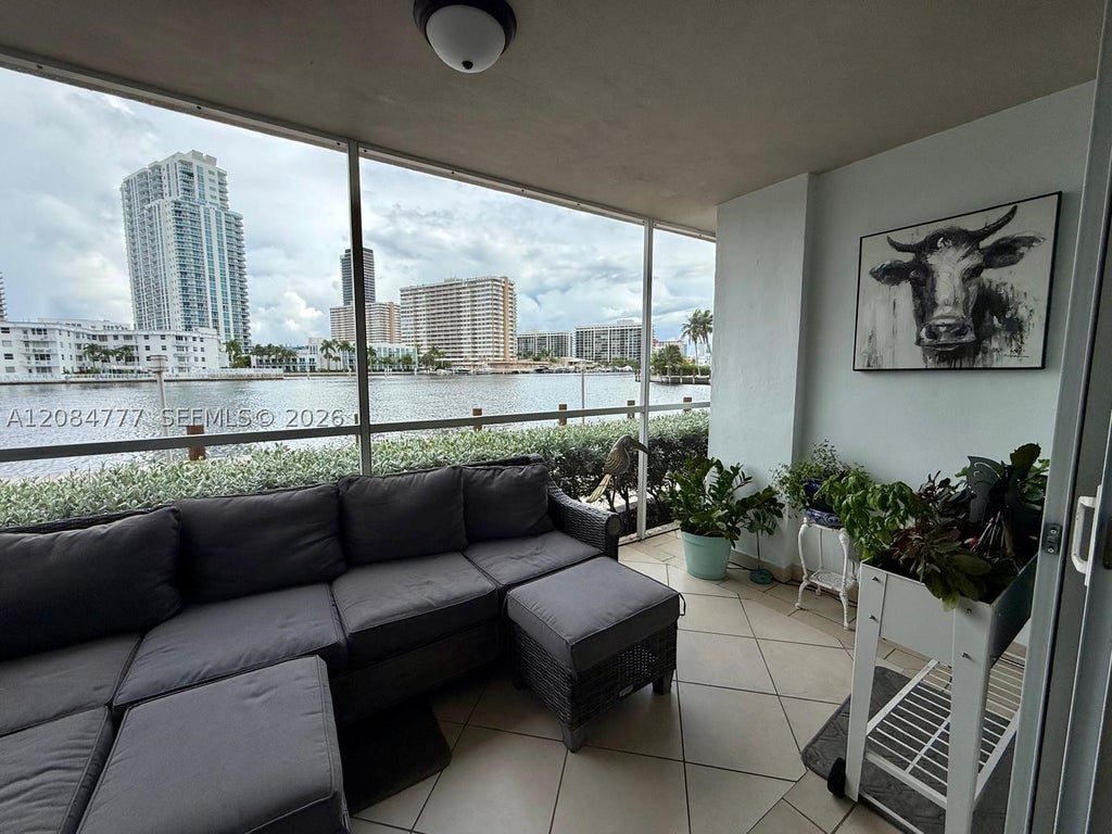 Photo of 121 Golden Isles Dr #1, Hallandale Beach, FL 33009 (MLS # A12084777)