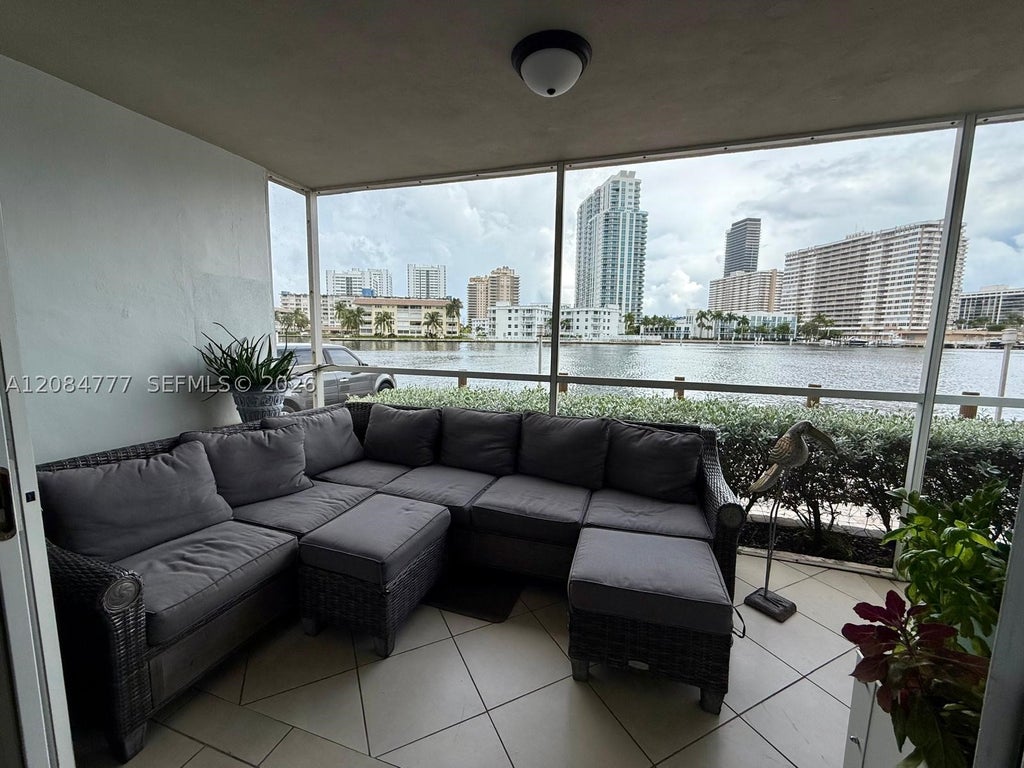 Photo of 121 Golden Isles Dr #1, Hallandale Beach, FL 33009 (MLS # A12084777)