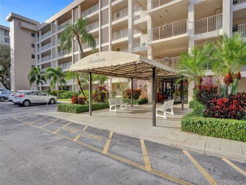 Photo of 2651 S Course Dr #410, Pompano Beach, FL 33069 (MLS # A11954824)