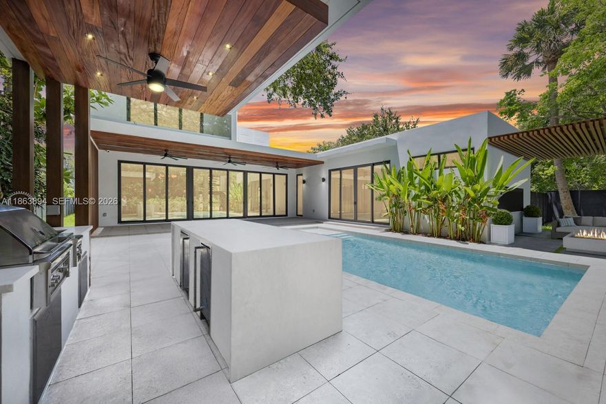 Brand New impeccably designed 5/5.5 home w/ grand indoor-outdoor living. Step through the front door to find yourself in your own private retreat nestled in deep green foliage. Every room is its own suite w/ spa like bathrooms, walk-in closets & bright open design. Enjoy flawless attention to detail w/ top of the line designer finishes incl a gourmet Eat-In Kitchen made for entertaining, Wine Storage, giant walk-in Pantry, Media Room & Open Dining overlooking lushly landscaped outside entertainment area. Nothing beats the resort feel of this saltwater pool, summer kitchen & cabana bath, all secluded in your own private Tropical Oasis. Lutron, Sonos, Smart Blinds/Doors, Security, Air conditioned 2-car garage. All in desirable Miami Shores, near MiMO shops, restaurants, A+ schools, parks