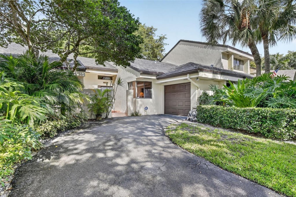 Photo of 369 NW 97th Ave, Plantation, FL 33324 (MLS # A12023560)