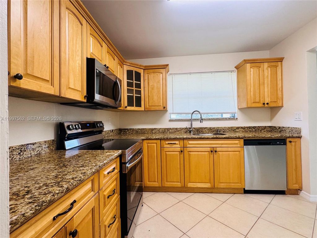 Photo of 8791 NW 12th St, Pembroke Pines, FL 33024 (MLS # A11997562)