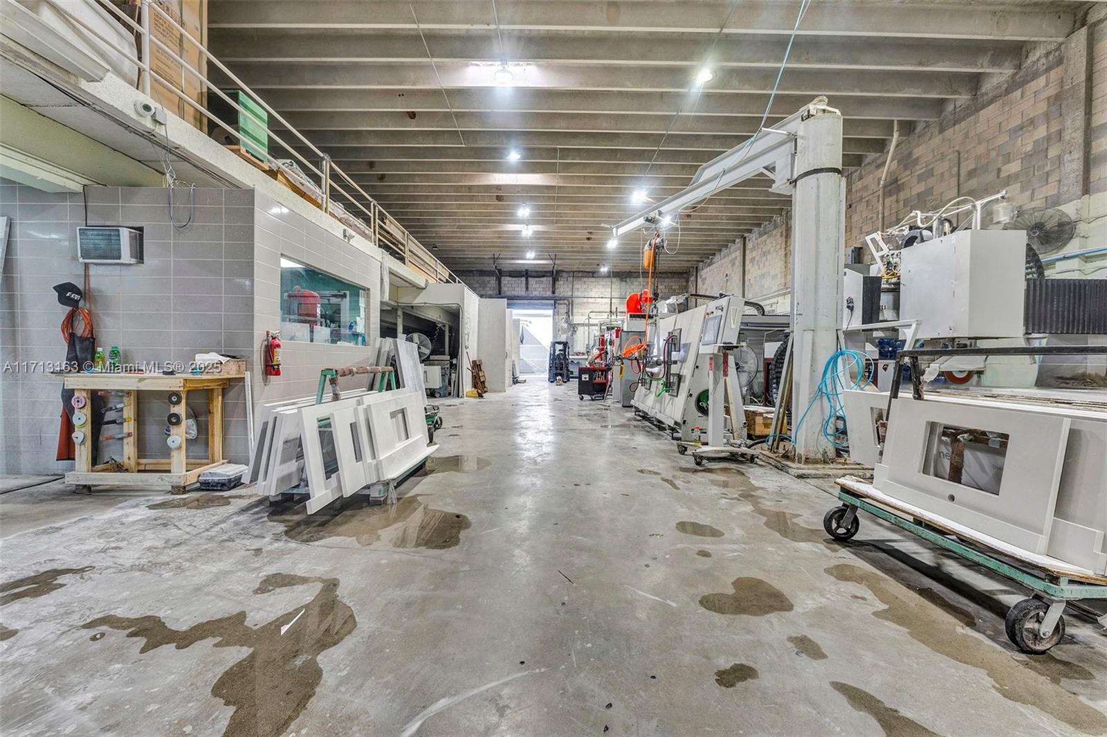 Property Details:
- Lot Size: 17,082 square feet
- Building Size: 7,952 square feet
- Number of Bathrooms: 2
- Features Three-phase power
- Bay Door North: 8 feet high by 8 feet wide
- Bay Door West: 13 feet high by 10 feet wide
- Includes 18 parking spots