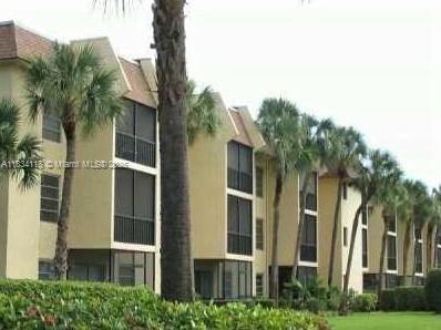 Tastefully remodeled 1 bedroom plus enclosed den area for a second bedroom or office in sought after East Boca. Unit features wood floors, remodeled kitchen with stainless appliances, private screened balcony, walk in closets, ample guest parking. Walking distance to FAU and short drive to Mizner Park, Town Center Mall, houses of worship, hospital, I-95 and the beaches. WATER, BASIC CABLE & PEST CONTROL INCLUDED. All ages welcome. No Pets. Secure bldg. with Medeco Key & security video cameras in lobby and every floor. Tele-entry at lobby. Amenities include clubhouse with pool, tennis courts, guest parking and onsite management. Easy to show and rent