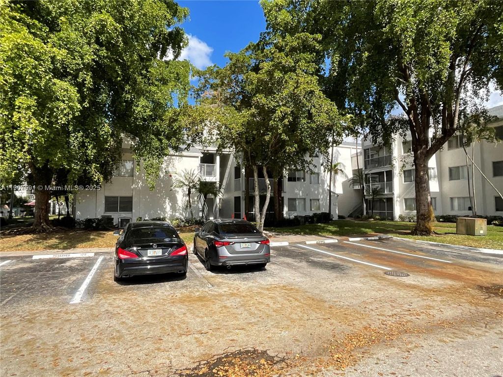 Photo of 5672 Rock Island Rd #235, Tamarac, FL 33319 (MLS # A11907591)