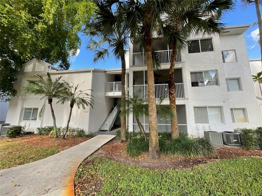 Photo of 5672 Rock Island Rd #235, Tamarac, FL 33319 (MLS # A11907591)