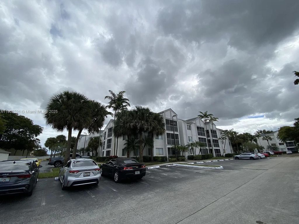 Photo of 5672 Rock Island Rd #235, Tamarac, FL 33319 (MLS # A11907591)