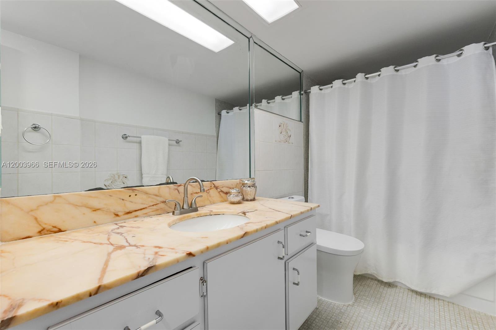 THE CARRIAGE HOUSE CONDO - Residential