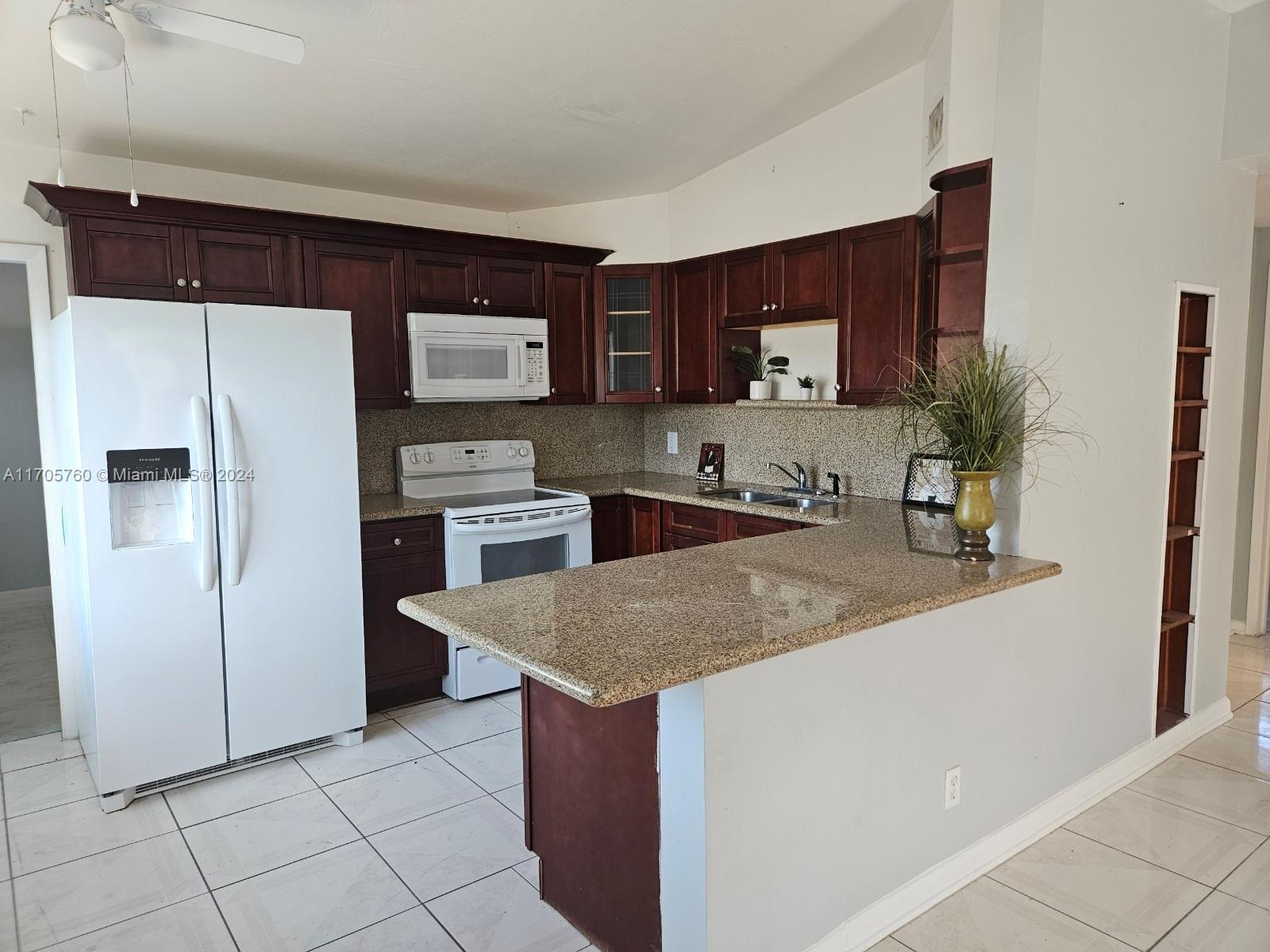 Lovely 3 bedrooms and 2 full baths single family home with fully fenced huge back yard. Upgraded kitchen with newer dishwasher & fridge and range. No carpeting at all, TILE throughout. Full size washer & dryer. Remodeled Master bathroom. No HOA, quick move in. close to Mall and I-95. Pets are welcome.