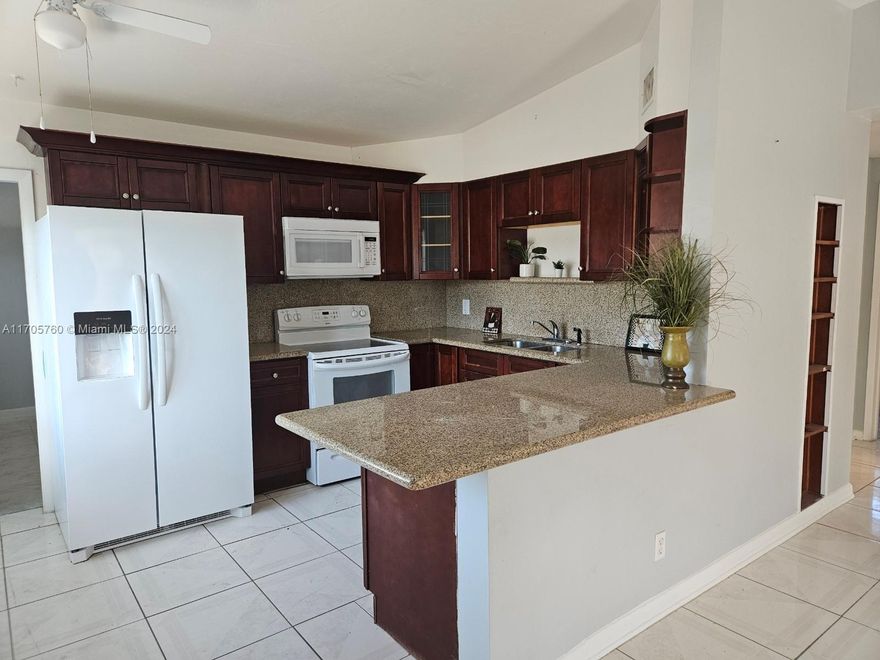 Lovely 3 bedrooms and 2 full baths single family home with fully fenced huge back yard. Upgraded kitchen with newer dishwasher & fridge and range. No carpeting at all, TILE throughout. Full size washer & dryer. Remodeled Master bathroom. No HOA, quick move in. close to Mall and I-95. Pets are welcome.