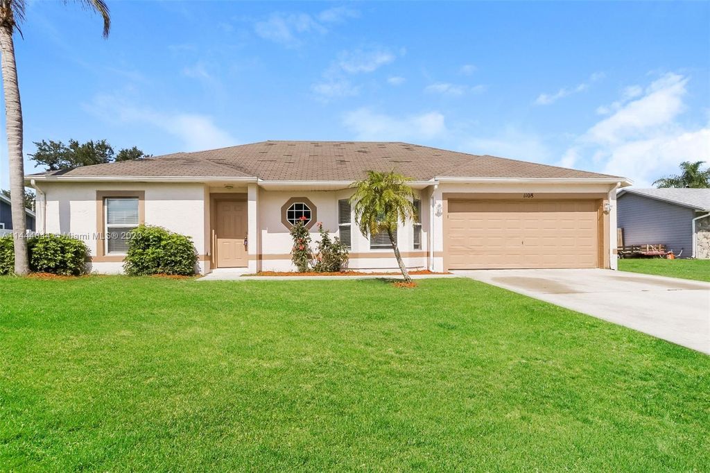 Photo of 1108 SW Hogan St, Port Saint Lucie, FL 34983 (MLS # A11444044)