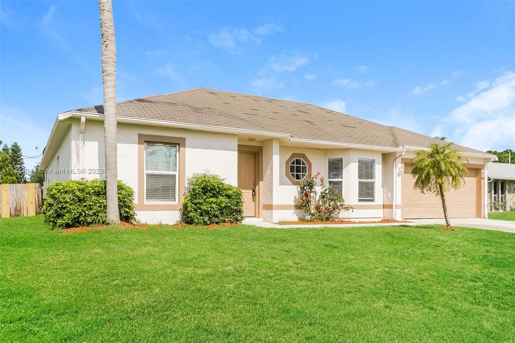 Photo of 1108 SW Hogan St, Port Saint Lucie, FL 34983 (MLS # A11444044)