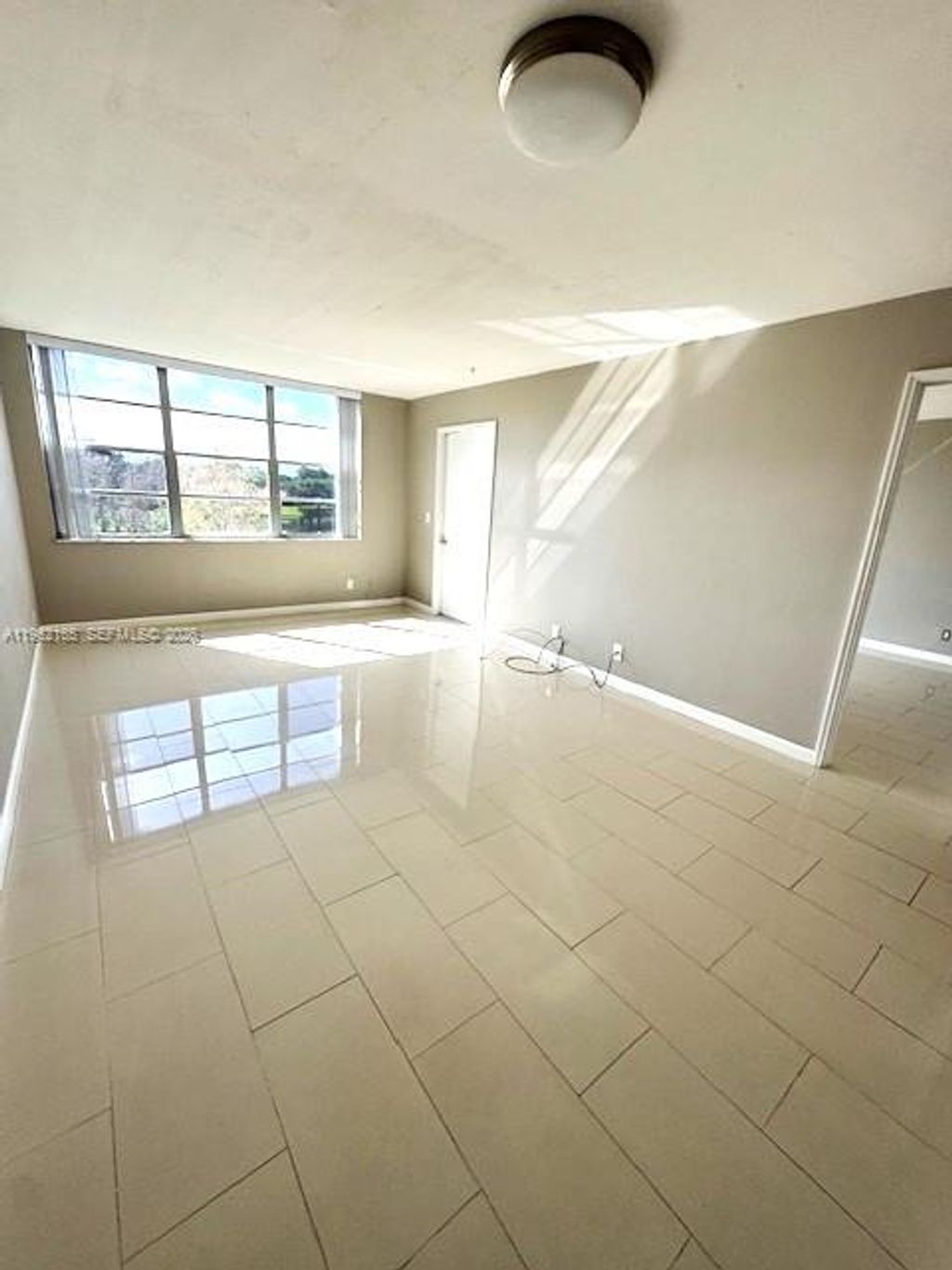 Photo of 9470 Live Oak Pl #308, Davie, FL 33324 (MLS # A11962165)