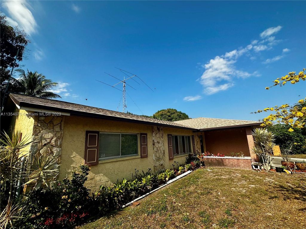 Photo of 201 Laken Dr, West Palm Beach, FL 33409 (MLS # A11354070)