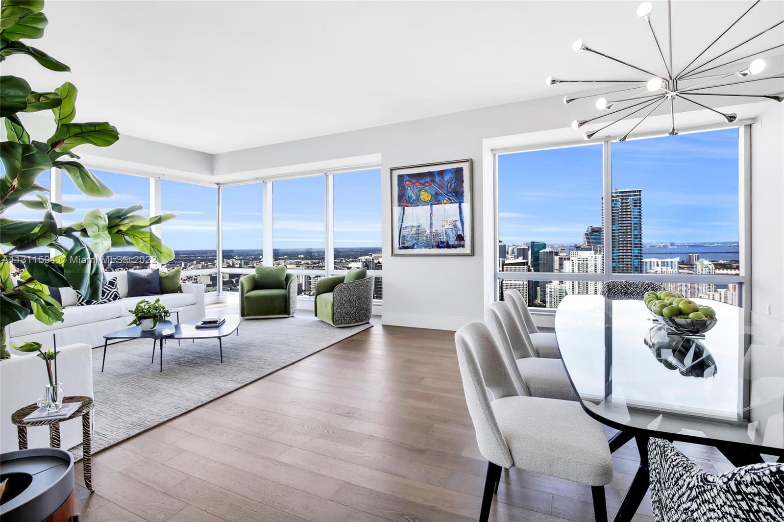 Very hard to find a better view of Metropolitan Miami than this recently remodeled corner unit in the prestigious Four Seasons Residences. You will enjoy incredible sunrises AND sunsets from its large floor to ceiling windows. The Four Seasons Residences offers top 24/7 services even building engineers for any repairs needed, valet, in-room dining. The concierge does almost everything for you. Also complementary gym, Elite FS Hotel Card, private residences pool, a kiddie pool with hanging hammocks, access to the resort pool facilities and its several dining venues. It's one of the only units currently available in the desirable C line which boasts the best views in the building from Miami Beach to Coral Gables and Coconut Grove. Separate A/C cooled storage unit and a large parking garage.