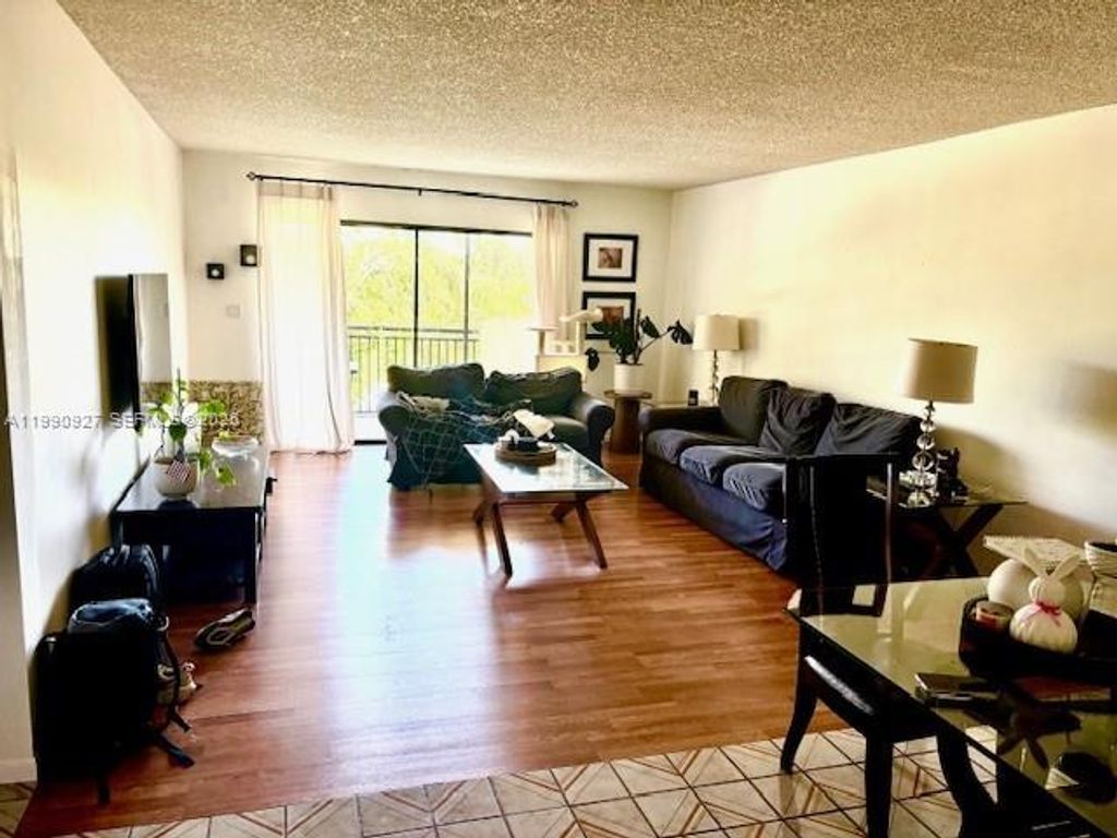 Photo of 16141 Blatt Blvd #309, Weston, FL 33326 (MLS # A11990927)