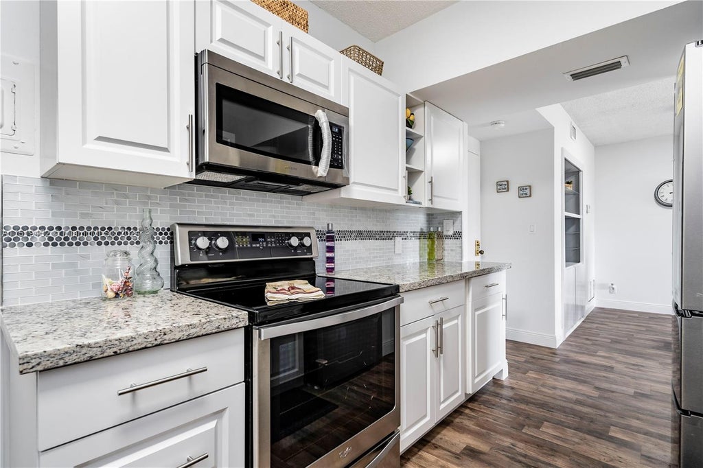 Photo of 4330 Hillcrest Dr #306, Hollywood, FL 33021 (MLS # A11519452)
