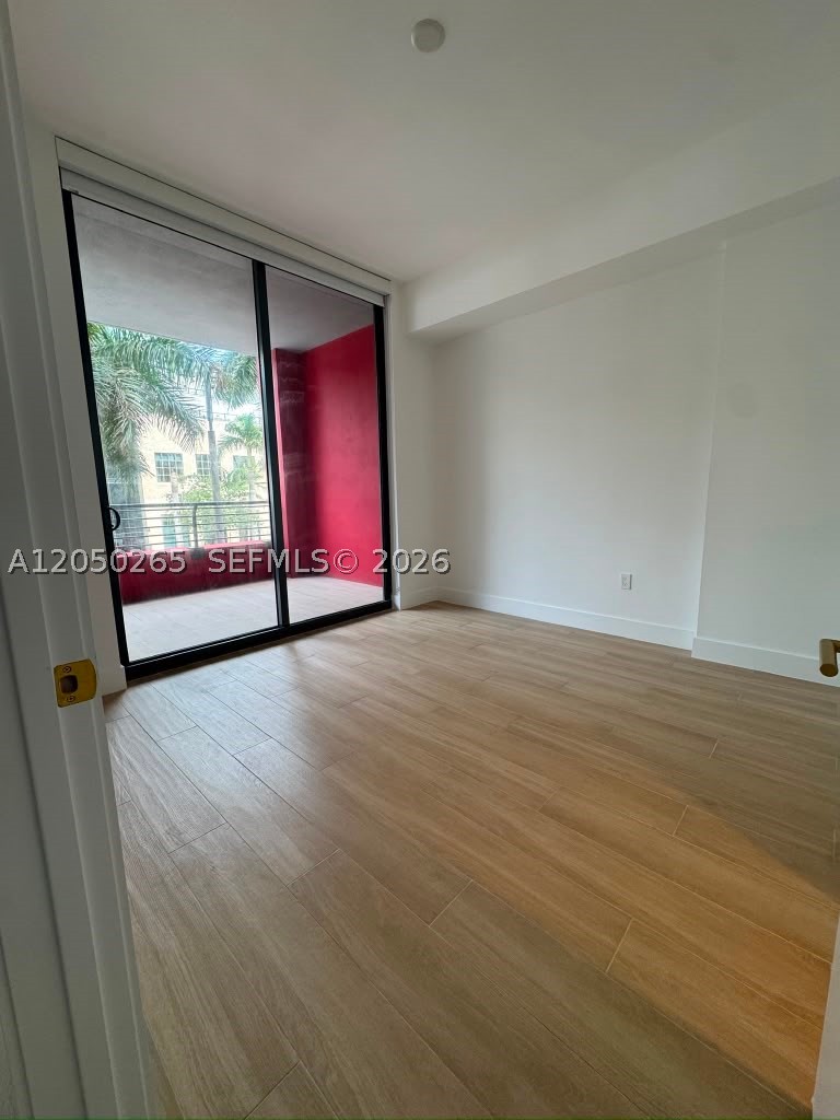 90 NE 32 ST 210
